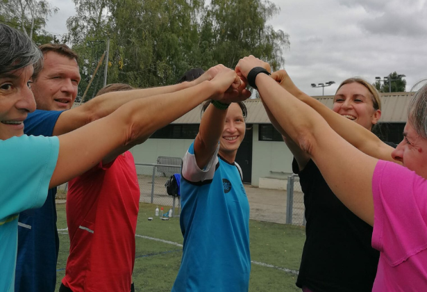 Groupe après une séance de coaching en extérieur